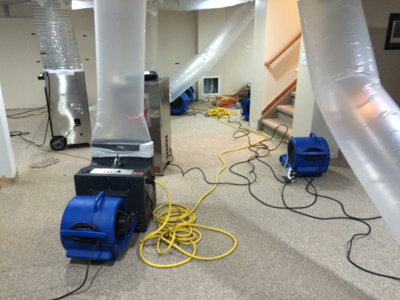 Drying equipment removing water from interior space